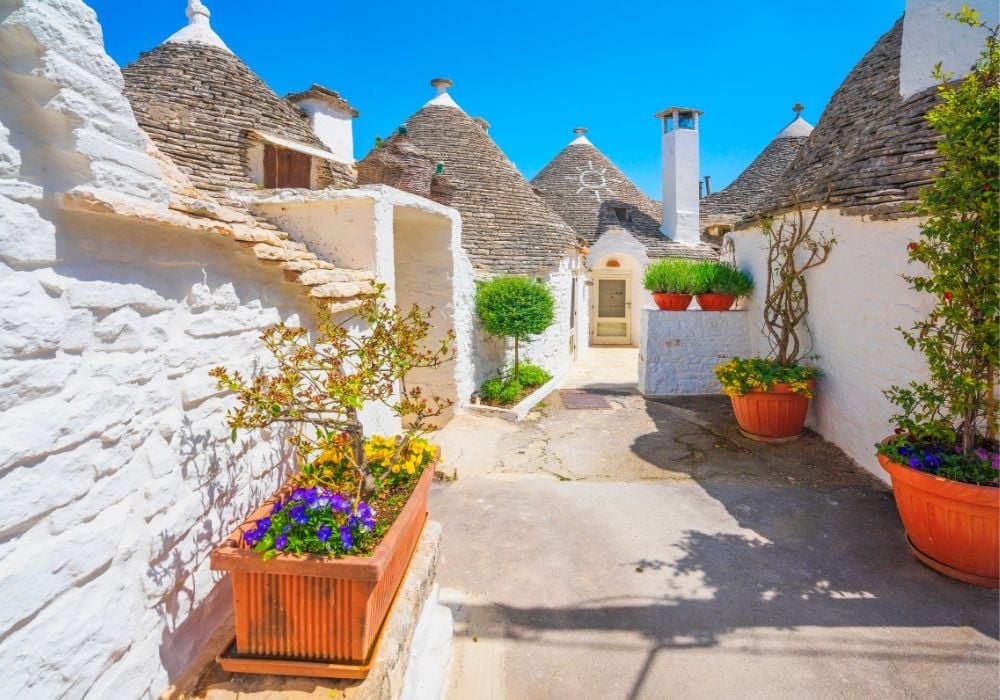 Trulli of Alberobello typical houses street view in Apulia, Italy.