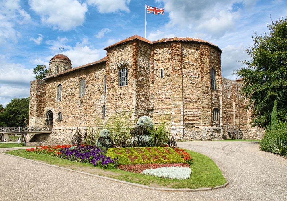 A beautiful Colchester Castle made of recycled Roman bricks on a clear blue sky