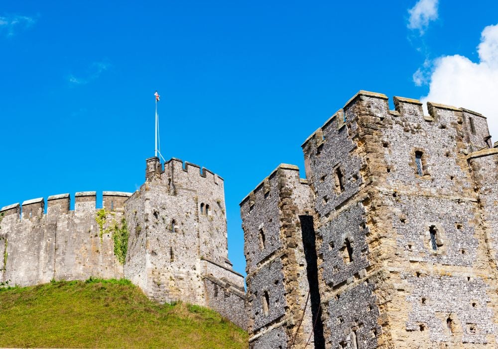 A a close-up view of Arundel Castle in England with blue sky behind it